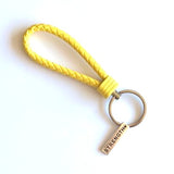 Sleutelhanger geel met sporthanger