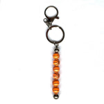 Stainless steel key ring with sports balls